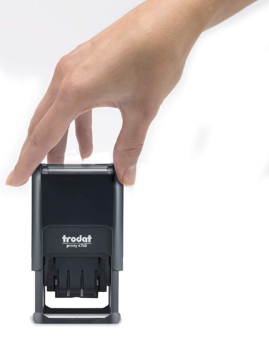 Hand pressing black Trodat Printy Dater 4750 stamp on white background